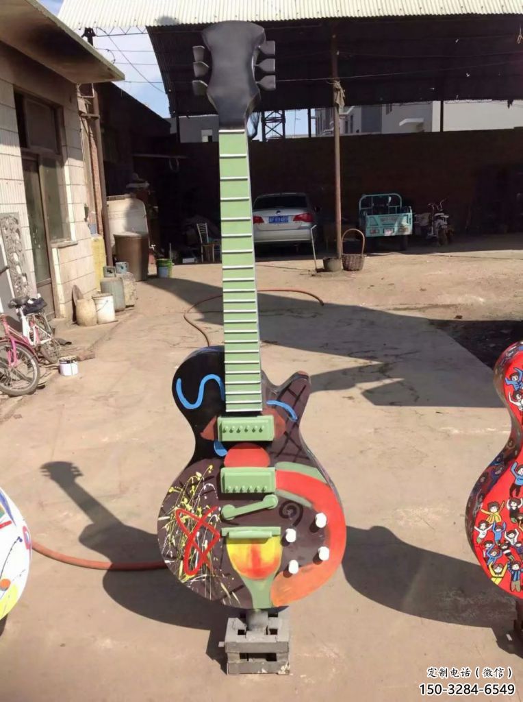 草地吉他雕塑 現代校園小品 大型雕塑