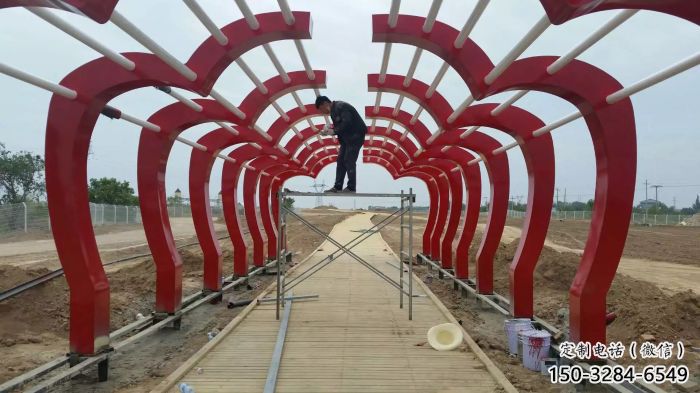 隧道大門雕塑廠家，烤漆美陳雕塑，抽象建筑設計